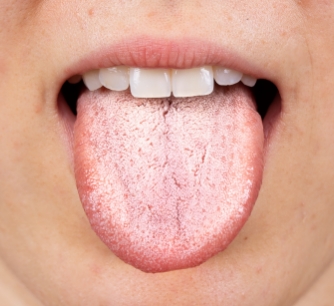 Close up of woman's mouth sticking her tounge out